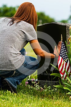 A Daughter at her Fathers Grave Site