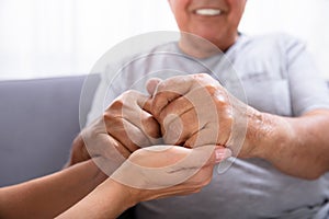 Daughter Holding Her Father`s Hand