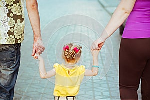 Daughter keeping her parents hands