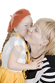 Daughter kissing her mother.