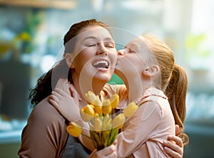 daughter and mom with flowers