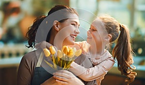 daughter and mom with flowers