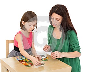 Daughter and mom playing