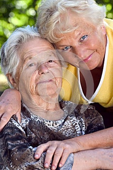 Daughter and mother cuddling