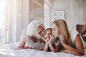 Daughter, mother and grandmother at home