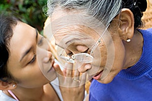 Daughter telling family secret to mother