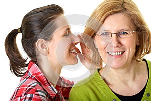 Daughter whisper to her mom, secrecy concept