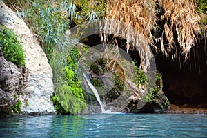 David Cave in rocks of Ein Gedi near Dead Sea photo