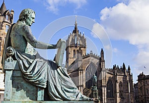 David Hume Statue and St Giles Cathedral in Edinburgh photo