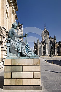 David Hume Statue with St. Giles Cathedral, Edinburgh, Scotland, UK photo