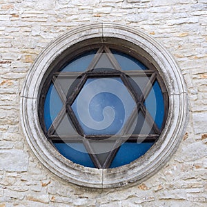 The David star in  blue stained glass