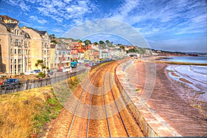 Dawlish Devon England with beach railway track and sea on blue sky summer day in HDR