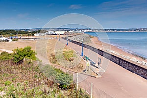 Dawlish Warren beach coast and promenade Devon England on blue sky summer day