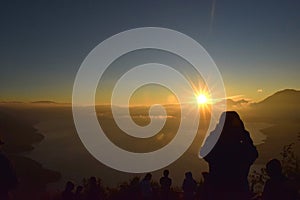 Dawn at Atitlan lake and outlook at volcanos