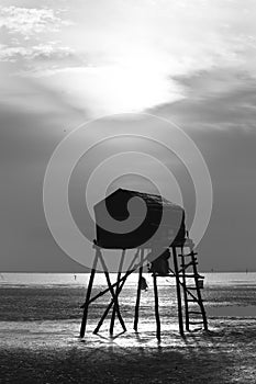 Dawn on the beach with a guardhouse