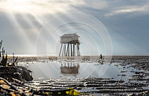 Dawn on the beach with a guardhouse