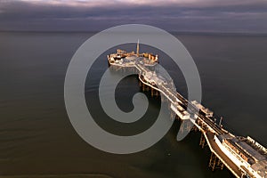 Dawn drone shot of Brighton Pier