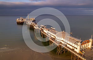 Dawn drone shot of Brighton Pier