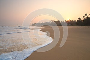 Dawn in Hikkaduwa beach, Sri Lanka photo