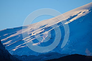 Dawn light on the east slope of the Villarrica volcano. Chili.