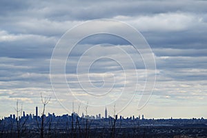 Dawn with low clouds. NYC New York City, skyline. From NJ New Jersey.