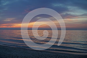 Dawn over the Black Sea and a man on a kayak who meets him.