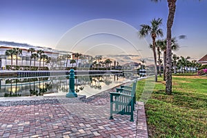 Dawn over the boats in Esplanade Harbor Marina in Marco Island