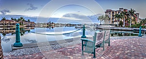 Dawn over the boats in Esplanade Harbor Marina in Marco Island