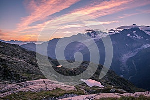 Dawn over Mont-Blanc Glaciers and Lake with Crimson Clear Sky