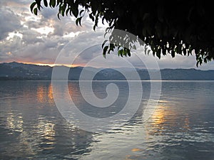 DAWN REFLECTION ON LAKE KIVU