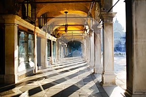 Dawn at San Marco Square, morning light and ancient columns. Venice, Italy