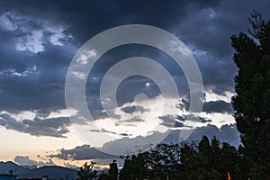 Dawn shot in Dehradun City with Mussoorie hills and majestic cloudscape. Uttarakhand, India