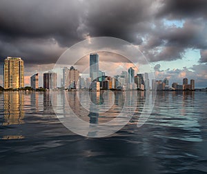 Dawn view of Miami Skyline reflected in water