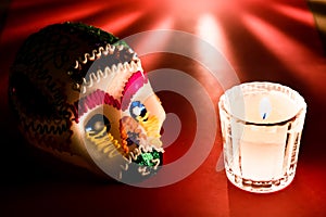 Sugar skull and candles - Calaverita - Ofrenda Dia de muertos photo