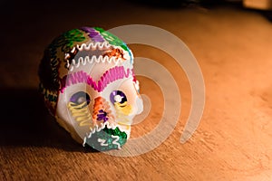 Sugar skull and candles - Calaverita - Ofrenda Dia de muertos photo