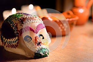 Sugar skull and candles - Calaverita - Ofrenda Dia de muertos photo