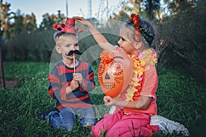 Day of the Dead and Halloween. Cute kids wearing in themed costumes for fun party