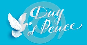 Day of Peace lettering text for greeting card. White dove with branch symbol of peace