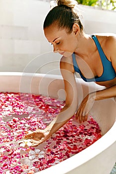 Day Spa Body Care. Woman Relaxing Near Flower Bath Outdoors