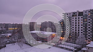 Day to night city Winter time lapse in Eastern Europe with residential apartment buildings.