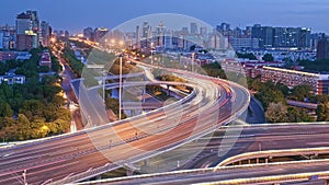 Day to night time-lapse of city traffic. Rush hour on high road at night