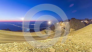 Day to night timelapse with rocks from Jebel Hafeetwith impressive view over the city.