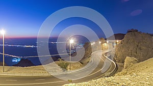 Day to night timelapse with rocks from Jebel Hafeetwith impressive view over the city.