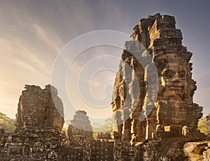 Day view of ancient temple Bayon Angkor with stone faces Siem Reap, Cambodia