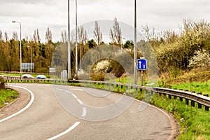 Day view background of UK Motorway Road Sign