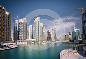 Day view of Dubai Marina bay with clear sky, UAE