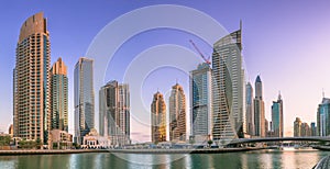 Day view of Dubai Marina bay with clear sky, UAE