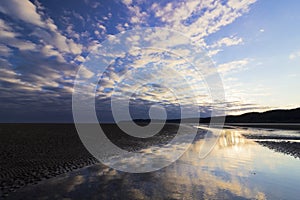 Daybreak coastal cloudscape from Red Wharf Bay, Isle of Anglesey, North Wales