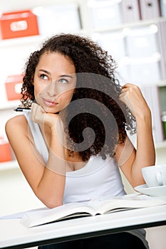 Daydreaming Teenager with Book