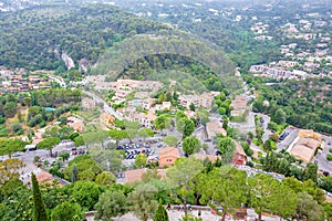 Daylight foggy view to Eze, Cote d`Azur village with medieval ho